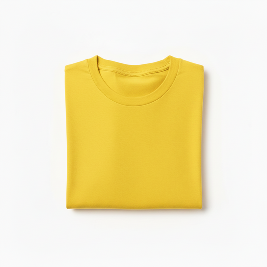 Folded yellow shirt, short-sleeved, crew neck, plain fabric, displayed on a white background.